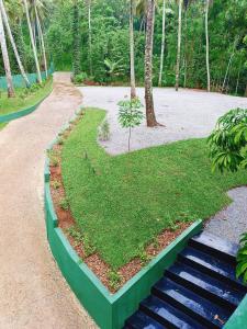 a park with a heart shaped garden in the middle at Khs resort in Gelioya