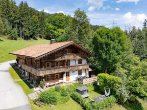 an overhead view of a large wooden house at Schneiderhof in Itter