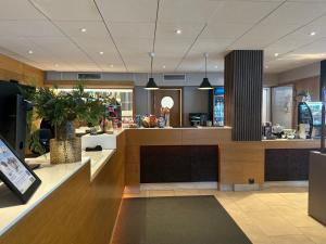 a lobby of a store with a counter at Spar Hotel Gårda in Gothenburg