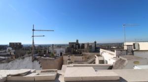 a view of a city from the roof of a building at Mastropaolo42 Luxury B&B in Grottaglie