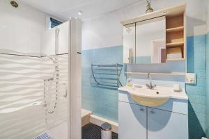 a bathroom with a sink and a shower at Maison De Campagne in Ligneyrac +27 photos