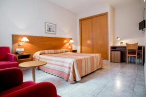 Postel nebo postele na pokoji v ubytování Hotel Rostits + 18 fotografií