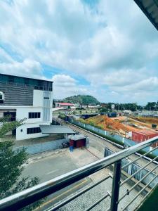 a view of a train station with a building at Soilsmart Haven in Abuja