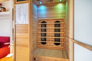 a sauna with a built in wine cellar at Ferienappartement in Black Forest in Baiersbronn +19 photos