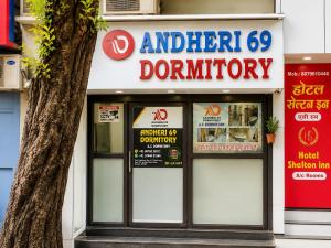 a sign for an ant kitchen donut shop at Andheri-69-Dormitory in Mumbai