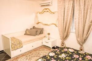a small bedroom with a bed and a mirror at Villa Beyond Bar in Bar +40 photos