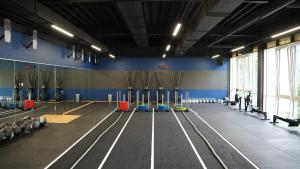 an empty gym with a bowling alley at Sportschule Oberhaching in Oberhaching