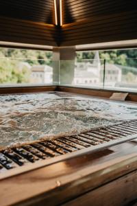 a close up of a counter top in a room at Hôtel Le Sanglier des Ardennes in Durbuy