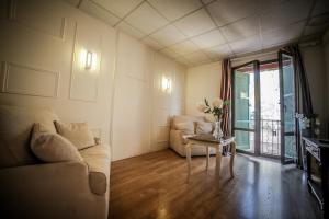 a living room with a couch and a table at Castellu Rossu in Lucciana