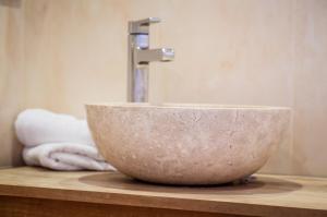 a bowl sink on a counter in a bathroom at Castellu Rossu in Lucciana