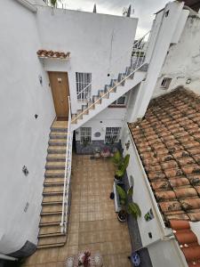an overhead view of a staircase in a building at Puertas de la Catedral in Córdoba