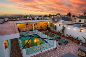 a view from the roof of a house with a pool at Riad Dar Rabiaa in Rabat