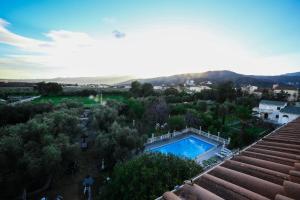 a view of a pool from the roof of a house at Castellu Rossu in Lucciana