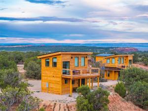 a row of modular homes on top of a hill at Tiny Cabin #3 at The Cedars in Kanab