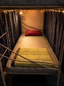 a small bunk bed in a room with at F1 Riverside Mee Udang in Malacca +1 photo