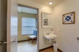 a bathroom with a sink and a toilet at Sweet Stay in Hershey +8 photos