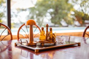 a table with a toy figurines on top of it at La VILLA DU REVE in Ulcinj