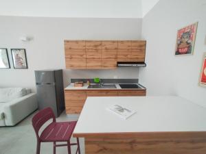 a kitchen with a sink and a counter top at Casa Mario in San Severo +2 photos