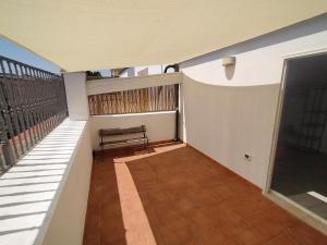 a balcony of a house with a bench at Casa Mario in San Severo