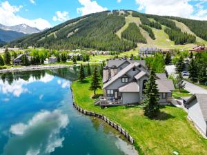an aerial view of a house on an island in a river at Woods12 Townhome Pet Friendly in Copper Mountain