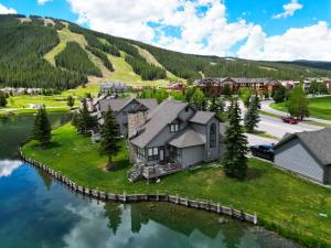 an aerial view of a house on an island in the water at Woods12 Townhome Pet Friendly in Copper Mountain