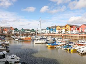a bunch of boats are docked in a marina at Meadow View Cottage in Exmouth