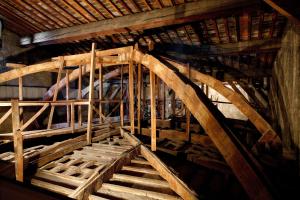an attic with wooden stairs in a building at Palazzo Firenze by Baglioni Hotels & Resorts in Florence +48 photos