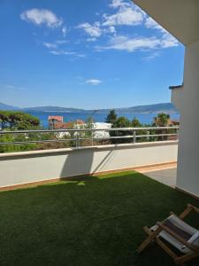 a view from the balcony of a house at Sea View Apartment in Bijela