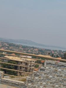 arial view of a building under construction on a hill at Pearl Stay in Entebbe