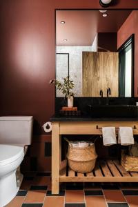 a bathroom with a sink and a toilet at New Paltz Way Hotel in New Paltz +34 photos