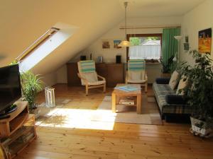 a living room with a couch and a table at Fewo Glaser in Lug