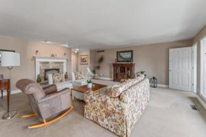 a living room with two couches and a table at Summer Fun Wenatchee home in Wenatchee