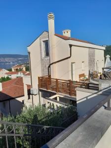 a view of a house from the balcony at Apartman 4 sa spavacom in Zelenika
