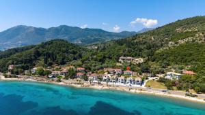 an aerial view of a resort on a beach at Lemon Garden Apartments in Lygia