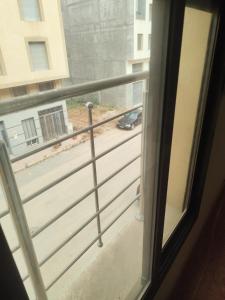 a view of a street from a window at Aroui aireport in Nador Airport