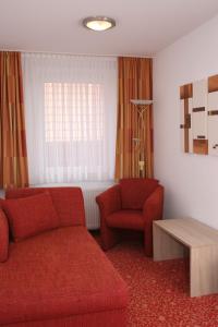 Posezení v ubytování Hotel Petersen