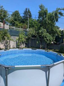 a swimming pool in a yard at Green Forest Resort Sarajevo in Sarajevo