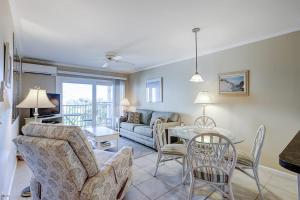 a living room with a couch and a table at Beachwood Place 3E in Hilton Head Island