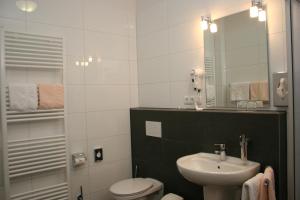 Koupelna v ubytování Hotel Petersen