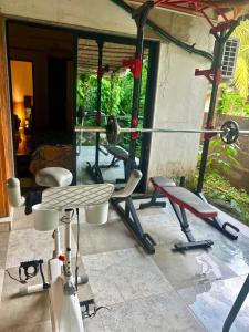 a group of exercise equipment in a room at Harmals Studios & Apartments in Arambol