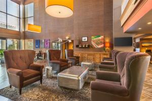 a salon with chairs and a waiting room at Best Western Plus Scottsdale Thunderbird Suites in Scottsdale