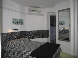 Ένα ή περισσότερα κρεβάτια σε δωμάτιο στο Apartment Lux