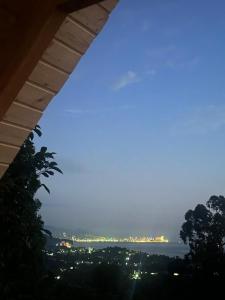 a view of a city from under a bridge at Sunset chalet Tsikhisdziri in Ts'ikhisdziri