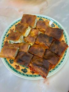 a plate of food on a table at Casa Cilone in Ragusa +6 photos