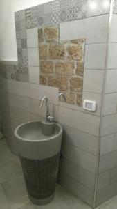 Ένα μπάνιο στο Acre Two Wells Zimmer