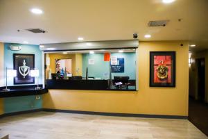 a waiting area of a fast food restaurant at MainStay Suites Chicago Hillside in Hillside