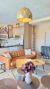 a living room with a couch and a table at Apartment Mira in Ružomberok