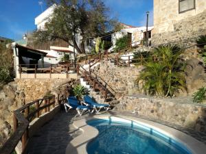 Bazén v ubytování Casa Rural La Cuadra nebo v jeho okolí