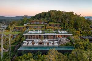an aerial view of a house on a hill at Fuso Concept Hotel in Florianópolis