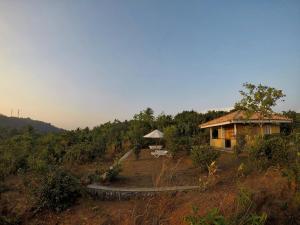 a house on the side of a hill at The Horizon Hill Top Villa in Unawatuna